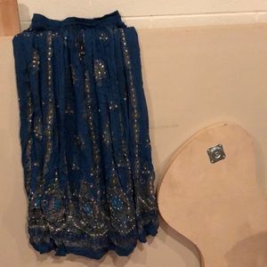 Ornate, blue skirt!